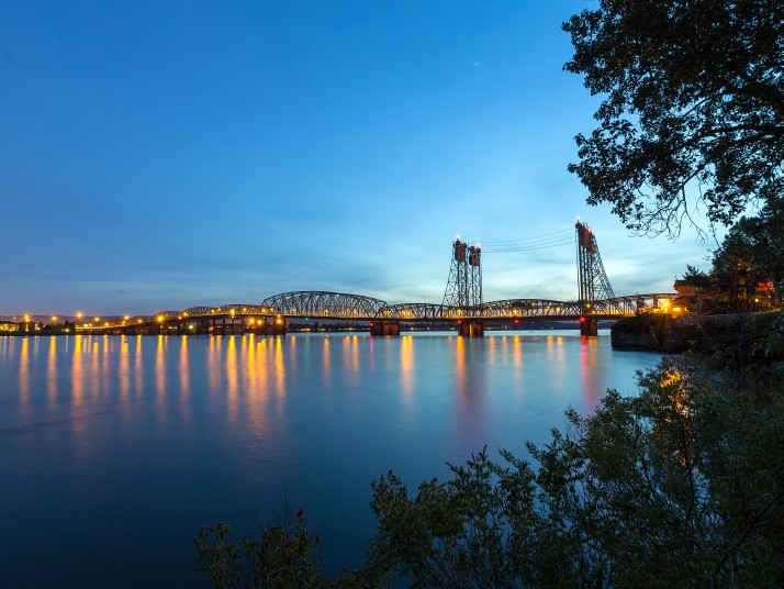 I5 Bridge over columbia river between Vancouver Washington and Portland Oregon at sunset.